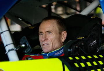 FORT WORTH, TX - NOVEMBER 07:  Mark Martin, driver of the #5 CARQUEST/Kellogg's Chevrolet, sits in his car during practice for the NASCAR Sprint Cup Series Dickies 500 at Texas Motor Speedway on November 7, 2009 in Fort Worth, Texas.  (Photo by Chris Graythen/Getty Images)
