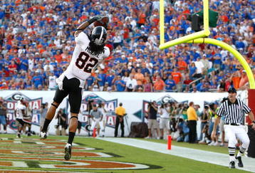 JACKSONVILLE, FL - OCTOBER 31:  Michael Moore #82 of the Georgia Bulldogs pull in this touchdown reception against the Florida Gators at Jacksonville Municipal Stadium on October 31, 2009 in Jacksonville, Florida.  (Photo by Kevin C. Cox/Getty Images)