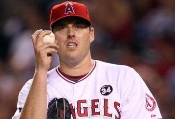 ANAHEIM, CA - OCTOBER 22:  John Lackey #41 of the Los Angeles Angels of Anaheim reacts in Game Five of the ALCS against the New York Yankees during the 2009 MLB Playoffs at Angel Stadium on October 22, 2009 in Anaheim, California.  (Photo by Stephen Dunn/Getty Images)