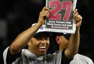 NEW YORK - NOVEMBER 04:  Mariano Rivera #42 of the New York Yankees holds up a copy of the New York Post as he celebrates their 7-3 win against the Philadelphia Phillies in Game Six of the 2009 MLB World Series at Yankee Stadium on November 4, 2009 in the Bronx borough of New York City.  (Photo by Chris McGrath/Getty Images)