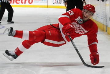 TORONTO, ON - NOVEMBER 07: Pavel Datsyuk #13 of the Detroit Red Wings is tripped up in his game against the Toronto Maple Leafs at the Air Canada Centre on November 7, 2009 in Toronto, Canada. The Maple Leafs defeated the Red Wings 5-1. (Photo by Bruce Bennett/Getty Images)