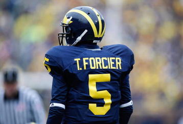 ANN ARBOR, MI - OCTOBER 24:  Tate Forcier #5 of the Michigan Wolverines looks on during the game against the Penn State Nittany Lions on October 24, 2009 at Michigan Stadium in Ann Arbor, Michigan. (Photo by  Gregory Shamus/Getty Images)