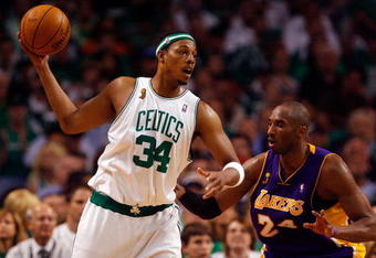 BOSTON - JUNE 17:  Paul Pierce #34 of the Boston Celtics looks to pass over Kobe Bryant #24 of the Los Angeles Lakers in Game Six of the 2008 NBA Finals on June 17, 2008 at TD Banknorth Garden in Boston, Massachusetts. NOTE TO USER: User expressly acknowledges and agrees that, by downloading and/or using this Photograph, user is consenting to the terms and conditions of the Getty Images License Agreement.  (Photo by Jim Rogash/Getty Images)