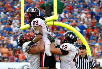 JACKSONVILLE, FL - OCTOBER 31:  Michael Moore #82 of the Georgia Bulldogs celebrates his touchdown against the Florida Gators at Jacksonville Municipal Stadium on October 31, 2009 in Jacksonville, Florida.  (Photo by Kevin C. Cox/Getty Images)