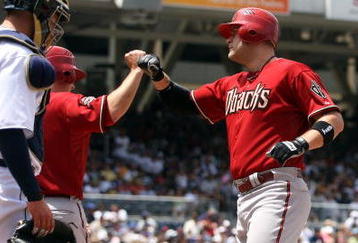 SAN DIEGO - APRIL 27:  Chris Snyder #19 of the Arizona Diamondbacks is congratulated by teammates  as catcher Josh Bard #28 of the san Diego Padres looks on after Snyder's homerun against the San Diego Padres during the MLB game on April 27, 2008 at Petco Park in San Diego, California.  (Photo by Donald Miralle/Getty Images)