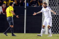 CARSON, CA - NOVEMBER 08:  David Beckham #23 of the Los Angeles Galaxy protests a call by referee Ricardo Salazar during the second half of Game 2 of the MLS Western Conference Semifinals match against Chivas USA at The Home Depot Center on November 8, 2009 in Carson, California.  The Galaxy defeated Chivas USA, 1-0, to advance to the MLS Western Conference Finals.  (Photo by Kevork Djansezian/Getty Images)