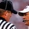 TUSCALOOSA, AL - NOVEMBER 07:  Head coach Les Miles of the Louisiana State University Tigers questions Head Linesman Johnny Crawford (L) during the game against the Alabama Crimson Tide at Bryant-Denny Stadium on November 7, 2009 in Tuscaloosa, Alabama.  (Photo by Kevin C. Cox/Getty Images)