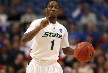 MINNEAPOLIS - MARCH 22:  Kalin Lucas #1 of the Michigan State Spartans gestures as he brings the ball up court against the USC Trojans during the second round of the NCAA Division I Men's Basketball Tournament at the Hubert H. Humphrey Metrodome on March 22, 2009 in Minneapolis, Minnesota.  (Photo by Jonathan Daniel/Getty Images)
