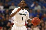 MINNEAPOLIS - MARCH 22:  Kalin Lucas #1 of the Michigan State Spartans gestures as he brings the ball up court against the USC Trojans during the second round of the NCAA Division I Men's Basketball Tournament at the Hubert H. Humphrey Metrodome on March 22, 2009 in Minneapolis, Minnesota.  (Photo by Jonathan Daniel/Getty Images)