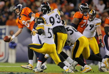 DENVER - NOVEMBER 09: Kyle Orton #8 of the Denver Broncos tries to get rid of the ball as he is pressured by the Pittsburgh Steelers at Invesco Field at Mile High on November 09, 2009 in Denver, Colorado. (Photo by Doug Pensinger/Getty Images)