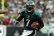 PHILADELPHIA - NOVEMBER 01:  Michael Vick #7 of the Philadelphia Eagles runs the ball for a first down in the first half against the New York Giants on November 1, 2009 at Lincoln Financial Field in Philadelphia, Pennsylvania.  (Photo by Jim McIsaac/Getty Images)