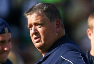 SOUTH BEND, IN - SETPEMBER 19: Head coach Charlie Weis of the Notre Dame Fighting Irish looks at a referee during a game against the Michigan State Spartans on September 19, 2009 at Notre Dame Stadium in South Bend, Indiana. (Photo by Jonathan Daniel/Getty Images)