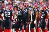 ORCHARD PARK, NY - NOVEMBER 01:  Marcus Stroud #99 of the Buffalo Bills stands on the field with teammates during the game against the Houston Texans at Ralph Wilson Stadium on November 1, 2009 in Orchard Park, New York. Houston won 31-10. (Photo by Rick Stewart/Getty Images)
