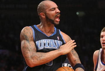 NEW YORK - NOVEMBER 09:  Carlos Boozer #5 of the Utah Jazz celebrates defeating the New York Knicks at Madison Square Garden on November 9, 2009 in New York City. NOTE TO USER: User expressly acknowledges and agrees that, by downloading and or using this photograph, User is consenting to the terms and conditions of the Getty Images License Agreement.  (Photo by Nick Laham/Getty Images)
