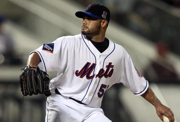 NEW YORK - AUGUST 20:  Johan Santana #57 of the New York Mets delivers a pitch against the Atlanta Braves on August 20, 2009 at Citi Field in the Flushing neighborhood of the Queens borough of New York City.  (Photo by Jim McIsaac/Getty Images)
