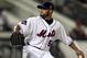 NEW YORK - AUGUST 20:  Johan Santana #57 of the New York Mets delivers a pitch against the Atlanta Braves on August 20, 2009 at Citi Field in the Flushing neighborhood of the Queens borough of New York City.  (Photo by Jim McIsaac/Getty Images)