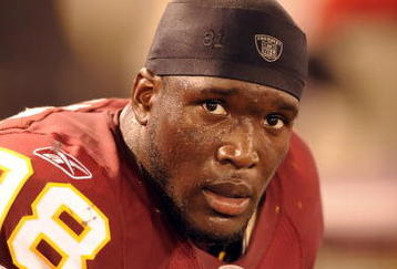 BALTIMORE, MD - AUGUST 13:  Brian Orakpo #98 of the Washington Redskins looks on during a NFL preseason football game against the Baltimore Ravens on August 13, 2009 at M & T Bank Stadium in Baltimore, Maryland.   (Photo by Mitchell Layton/Getty Images)