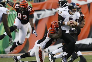 CINCINNATI - NOVEMBER 8: Carson Palmer #9 of the Cincinnati Bengals throws under pressure from the Baltimore Ravens at Paul Brown Stadium on November 8, 2009 in Cincinnati, Ohio.  (Photo by John Sommers II/Getty Images)