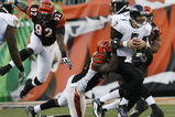 CINCINNATI - NOVEMBER 8: Carson Palmer #9 of the Cincinnati Bengals throws under pressure from the Baltimore Ravens at Paul Brown Stadium on November 8, 2009 in Cincinnati, Ohio.  (Photo by John Sommers II/Getty Images)