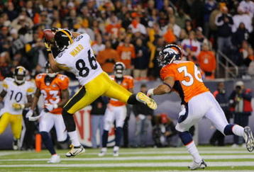 DENVER - NOVEMBER 09: Hines Ward #86 of the Pittsburgh Steelers catches a touchdown  in the third quarter past Josh Barrett #36 of the Denver Broncos at Invesco Field at Mile High on November 09, 2009 in Denver, Colorado. (Photo by Doug Pensinger/Getty Images)
