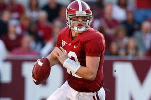TUSCALOOSA, AL - NOVEMBER 07:  Quarterback Greg McElroy #12 of the Alabama Crimson Tide rushes upfield against the Louisiana State University Tigers at Bryant-Denny Stadium on November 7, 2009 in Tuscaloosa, Alabama.  (Photo by Kevin C. Cox/Getty Images)
