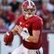 TUSCALOOSA, AL - NOVEMBER 07:  Quarterback Greg McElroy #12 of the Alabama Crimson Tide rushes upfield against the Louisiana State University Tigers at Bryant-Denny Stadium on November 7, 2009 in Tuscaloosa, Alabama.  (Photo by Kevin C. Cox/Getty Images)