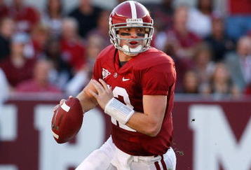 TUSCALOOSA, AL - NOVEMBER 07:  Quarterback Greg McElroy #12 of the Alabama Crimson Tide rushes upfield against the Louisiana State University Tigers at Bryant-Denny Stadium on November 7, 2009 in Tuscaloosa, Alabama.  (Photo by Kevin C. Cox/Getty Images)