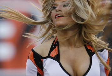 CINCINNATI - NOVEMBER 8: Cincinnati Bengals cheerleaders cheer for their team against Baltimore Ravens at Paul Brown Stadium on November 8, 2009 in Cincinnati, Ohio.  (Photo by John Sommers II/Getty Images)