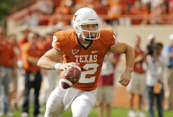 AUSTIN, TX - NOVEMBER 07:  Quarterback Colt McCoy #12 of the Texas Longhorns rolls out against the UCF Knights on November 7, 2009 at Darrell K Royal - Texas Memorial Stadium in Austin, Texas.  Texas won 35-3.  (Photo by Brian Bahr/Getty Images)