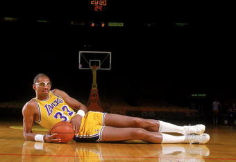 Undated: Kareem Abdul- Jabbar of the Los Angeles Lakers poses for the camera as he lays on the court.  Mandatory Credit: Rick Stewart  /Allsport