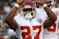 CHICAGO - AUGUST 07: Larry Johnson #27 of the Kansas City Chiefs celebrates a first quarter touchdown against the Chicago Bears on August 7, 2008 at Soldier Field in Chicago, Illinois. (Photo by Jonathan Daniel/Getty Images)