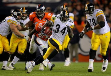 DENVER - NOVEMBER 09:  Rashard Mendenhall #34 of the Pittsburgh Steelers rushes 34 yards for a first down against the Denver Broncos in the fourth quarter during NFL action at Invesco Field at Mile High on November 9, 2009 in Denver, Colorado. The Steelers defeated the Broncos 28-10.  (Photo by Doug Pensinger/Getty Images)