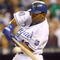 KANSAS CITY, MO - SEPTEMBER 24: Alberto Callaspo #13 of the Kansas City Royals swings at the pitch during the game against the Boston Red Sox on September 24, 2009 at Kauffman Stadium in Kansas City, Missouri. (Photo by Jamie Squire/Getty Images)
