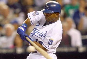 KANSAS CITY, MO - SEPTEMBER 24: Alberto Callaspo #13 of the Kansas City Royals swings at the pitch during the game against the Boston Red Sox on September 24, 2009 at Kauffman Stadium in Kansas City, Missouri. (Photo by Jamie Squire/Getty Images)
