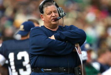 SOUTH BEND, IN - OCTOBER 03: Head coach Charlie Weis of the Notre Dame Fighting Irish watches as his team takes on the Washington Huskies on October 3, 2009 at Notre Dame Stadium in South Bend, Indiana.  Notre Dame defeated Washington 37-30 in overtime.  (Photo by Jonathan Daniel/Getty Images)