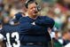 SOUTH BEND, IN - OCTOBER 03: Head coach Charlie Weis of the Notre Dame Fighting Irish watches as his team takes on the Washington Huskies on October 3, 2009 at Notre Dame Stadium in South Bend, Indiana.  Notre Dame defeated Washington 37-30 in overtime.  (Photo by Jonathan Daniel/Getty Images)