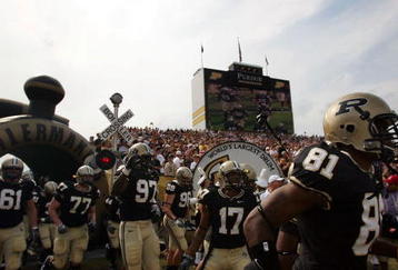 WEST LAFAYETTE, IN - SEPTEMBER 20:  The Purdue Boilermakers run on to the field before a game against the Central Michigan Chippewas at Ross-Ade Stadium on September 20, 2008 in West Lafayette, Indiana.  (Photo by Ronald Martinez/Getty Images)