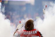 ATLANTA - NOVEMBER 08: John Abraham #55 of the Atlanta Falcons is introduced before facing the Washington Redskins at Georgia Dome on November 8, 2009 in Atlanta, Georgia. (Photo by Kevin C. Cox/Getty Images)