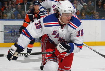 UNIONDALE, NY - OCTOBER 28:  P.A. Parenteau #38 of the New York Rangers skates against the New York Islanders at the Nassau Coliseum on October 28, 2009 in Uniondale, New York.  (Photo by Bruce Bennett/Getty Images)