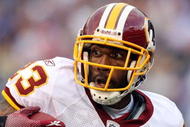 EAST RUTHERFORD, NJ - SEPTEMBER 13:  DeAngelo Hall #23 of the Washington Redskins runs the ball after an interception against the New York Giants on September 13, 2009 at Giants Stadium in East Rutherford, New Jersey.  (Photo by Jim McIsaac/Getty Images)
