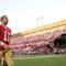 SAN FRANCISCO - NOVEMBER 08:  Alex Smith #11 of the San Francisco 49ers walks off the field after their loss to the Tennessee Titans at Candlestick Park on November 8, 2009 in San Francisco, California.  (Photo by Ezra Shaw/Getty Images)