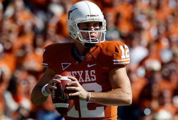 DALLAS - OCTOBER 17:  Quarterback Colt McCoy #12 of the Texas Longhorns drops back to pass against the Oklahoma Sooners at Cotton Bowl on October 17, 2009 in Dallas, Texas.  (Photo by Ronald Martinez/Getty Images)