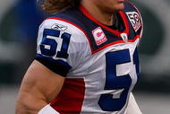 EAST RUTHERFORD, NJ - OCTOBER 18: Paul Posluszny #51 of the Buffalo Bills runs off the field following the coin toss before the game against the New York Jets on October 18, 2009 at Giants Stadium in East Rutherford, New Jersey. The Bills defeated the Jets 16-13 in overtime. (Photo by Jared Wickerham/Getty Images)