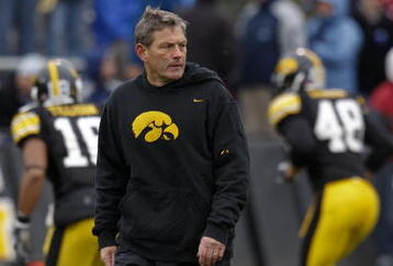 IOWA CITY, IOWA - NOVEMBER 8: Head Coach Kirk Ferentz of the Iowa Hawkeyes runs his team through pre-game drills before taking on the  Penn State Nittany Lions at Kinnick Stadium on November 8, 2008 in Iowa City, Iowa. Iowa defeated Penn State  24-23. (Photo by David Purdy/Getty Images)