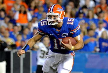 GAINESVILLE, FL - NOVEMBER 7: Quarterback Tim Tebow #15 of the Florida Gators rushes upfield against the Vanderbilt Commodores  on November 7, 2009 at Ben Hill Griffin Stadium in Gainesville, Florida.  (Photo by Al Messerschmidt/Getty Images) 