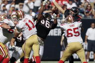 HOUSTON - OCTOBER 25:  Quarterback Alex Hill #11 of the San Francisco 49ers throws down-field against the Houston Texans at Reliant Stadium on October 25, 2009 in Houston, Texas. (Photo by Bob Levey/Getty Images)