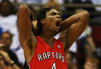 ORLANDO, FL - APRIL 20:  Chris Bosh #4 of the Toronto Raptors reacts after being called for a foul in the second half against the Orlando Magic in Game One of the Eastern Conference Quarterfinals during the 2008 NBA Playoffs at the Amway Arena on April 20, 2008 in Orlando, Florida. The Magic defeated the Raptors 114-100. NOTE TO USER: User expressly acknowledges and agrees that, by downloading and or using this photograph, User is consenting to the terms and conditions of the Getty Images License Agreement.  (Photo by Doug Benc/Getty Images)