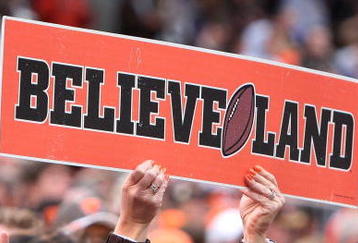 CLEVELAND - OCTOBER 04:  A fan of the Cleveland Browns cheers on his team as they play the Cincinnati Bengals at Cleveland Browns Stadium on October 4, 2009 in Cleveland, Ohio.  (Photo by Jim McIsaac/Getty Images)