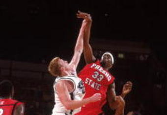 23 Nov 2001:  Center Melvin Ely #33 of the Fresno State Bulldogs jumps for the ball against forward Adam Ballinger #55 of the Michigan State Spartans during the NCAA game at Madison Square Garden in New York, New York.  Fresno State defeated Michigan State 63-58.Mandatory Credit:  Al Bello/Getty Images