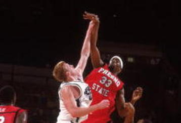 23 Nov 2001:  Center Melvin Ely #33 of the Fresno State Bulldogs jumps for the ball against forward Adam Ballinger #55 of the Michigan State Spartans during the NCAA game at Madison Square Garden in New York, New York.  Fresno State defeated Michigan State 63-58.Mandatory Credit:  Al Bello/Getty Images